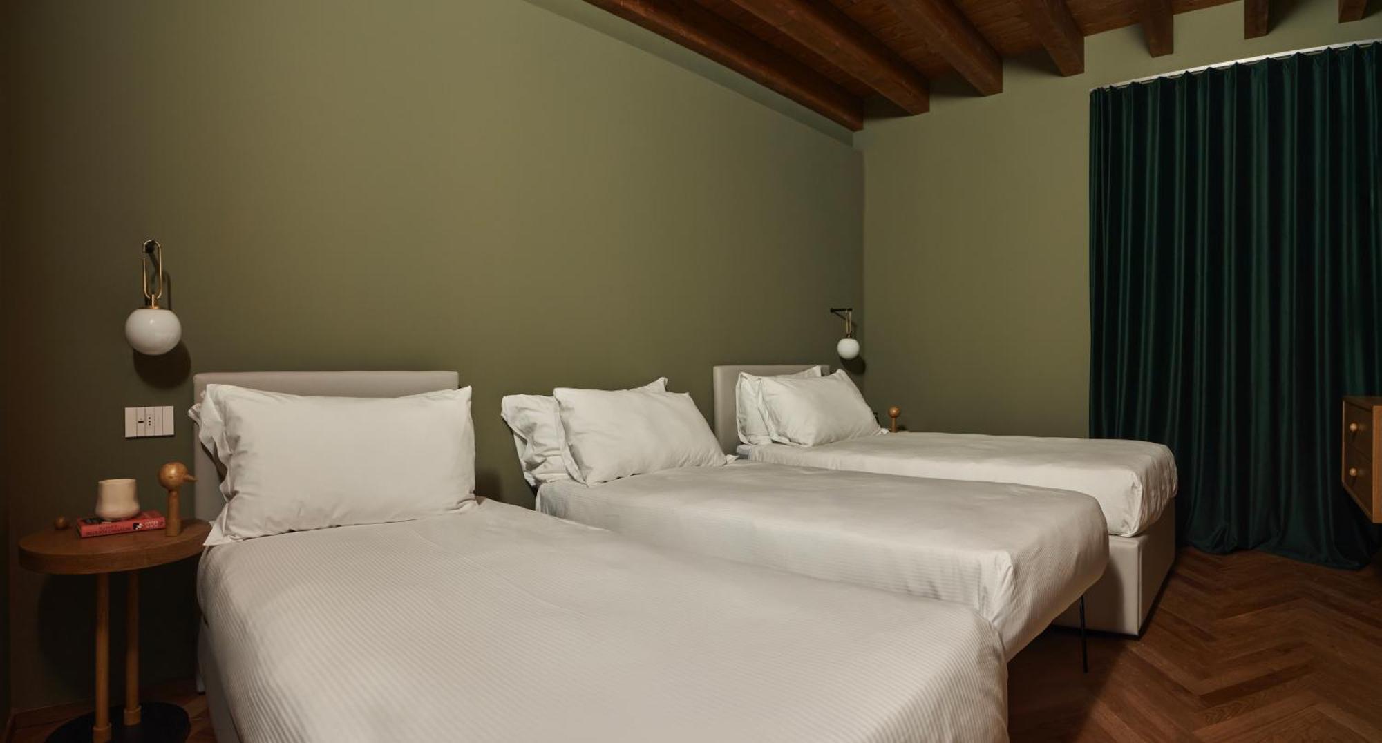 Rego Apartments - Boutique Aparthotel & Serenity Spa With Some Off-Site Apartments In The Heart Of Bergamo City Center Room photo